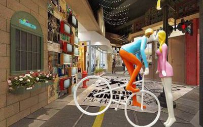 街道玻璃鋼彩繪男子騎車親吻的愛(ài)情雕塑